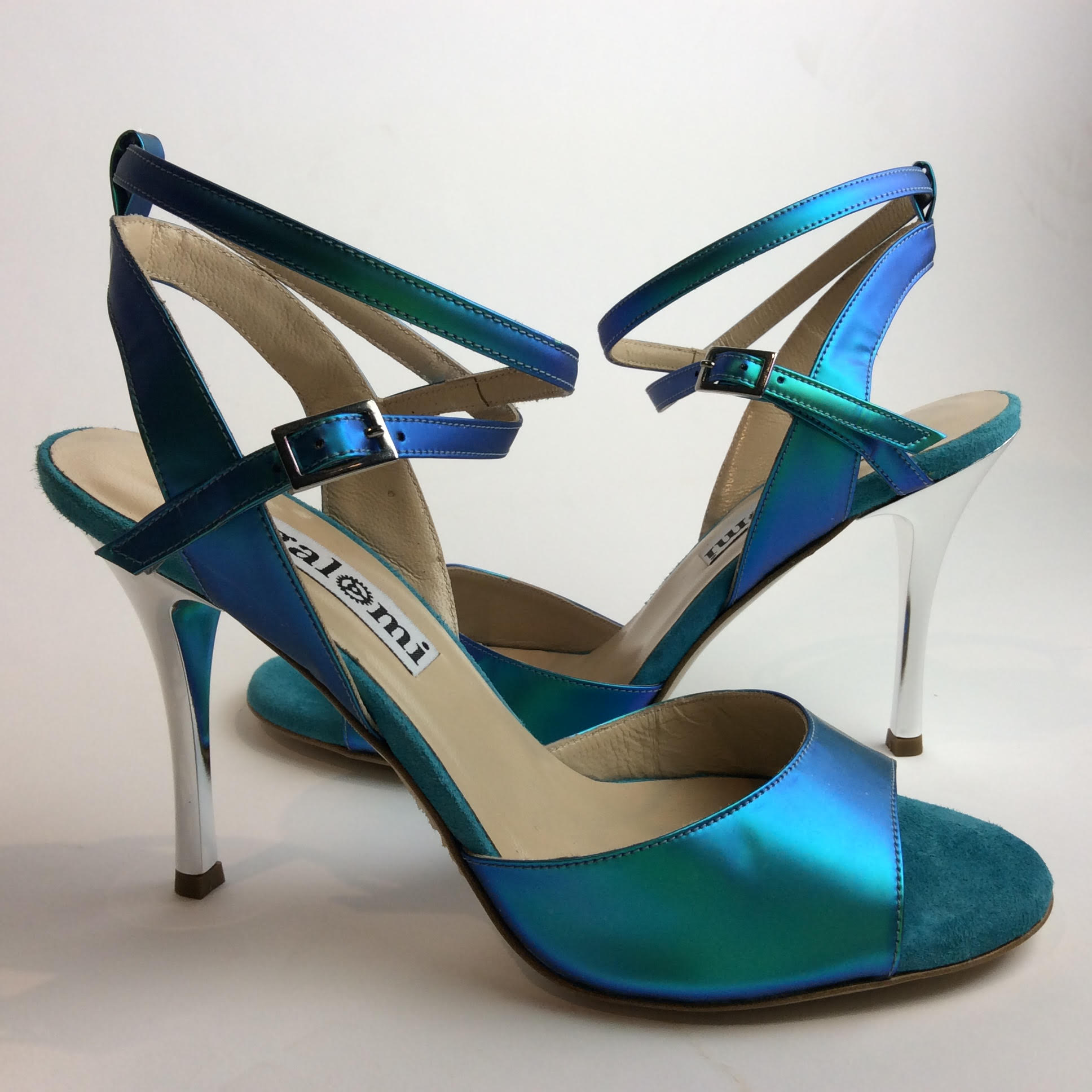 Elegant blue high-heeled sandals with ankle straps.