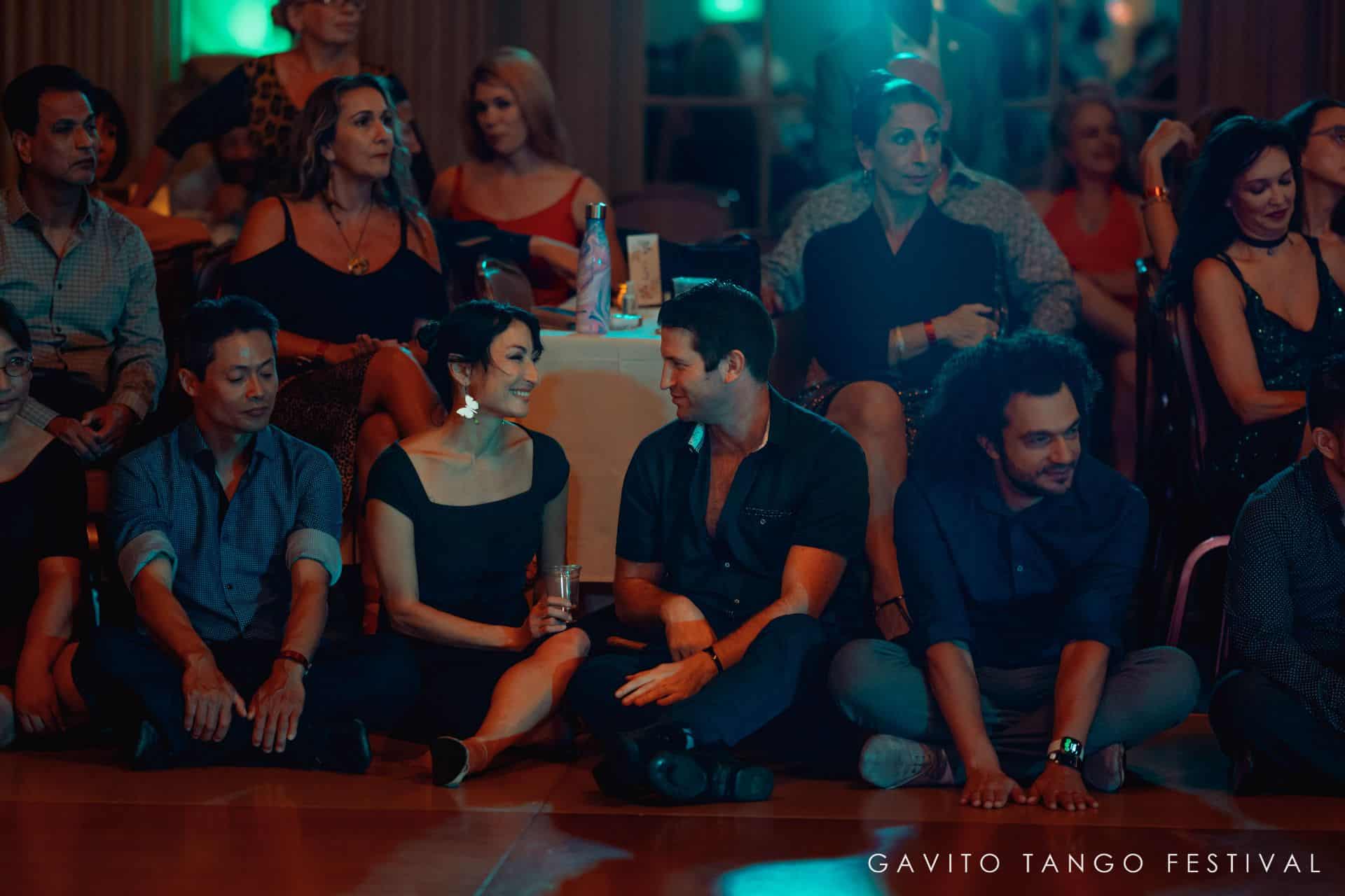 Group of young people posing together at a casual gathering.