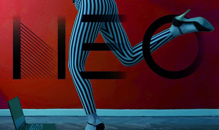 Person in striped pants and heels leaping with a hoop against a vibrant red background.