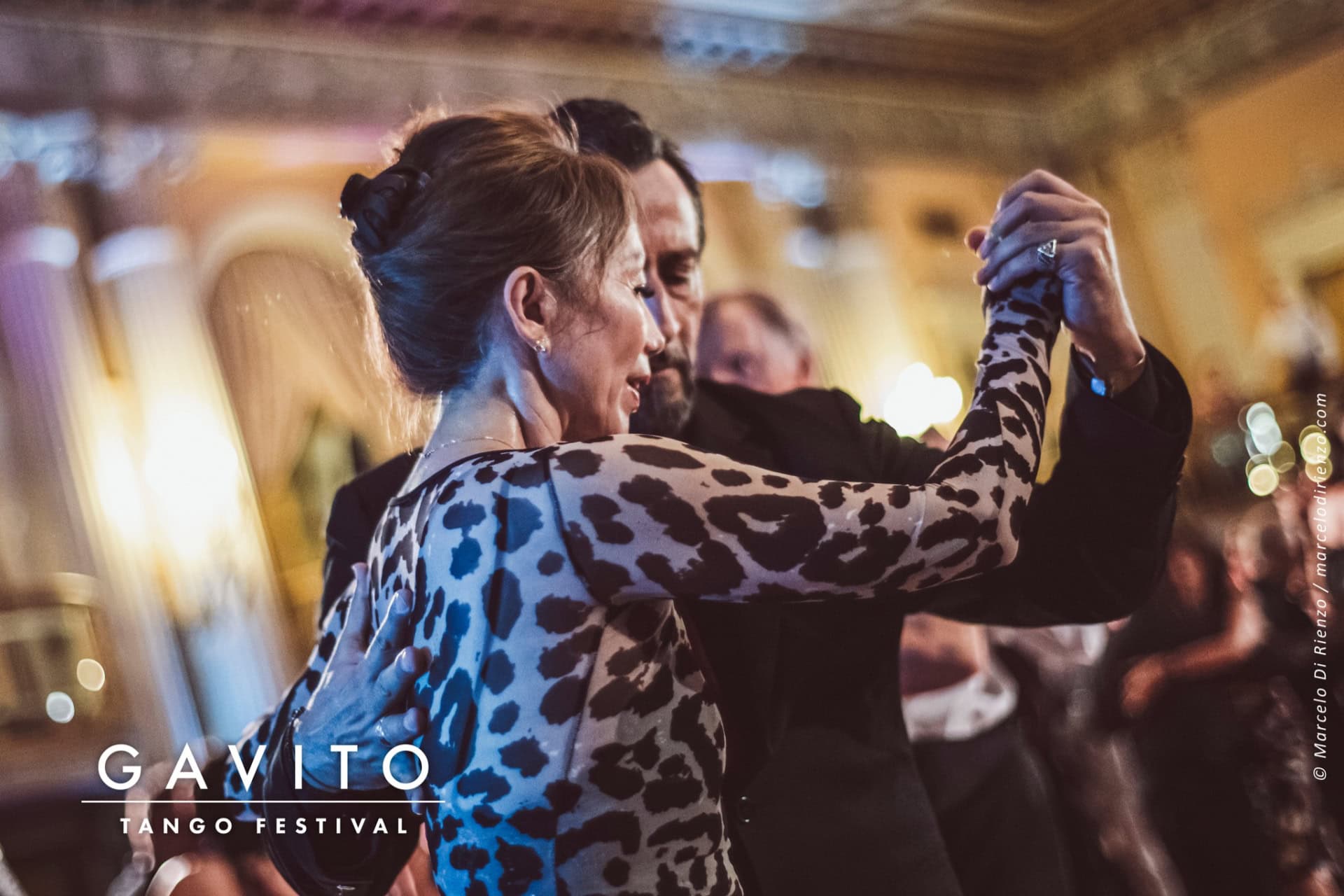 Two women taking a selfie, one in leopard print clothing.